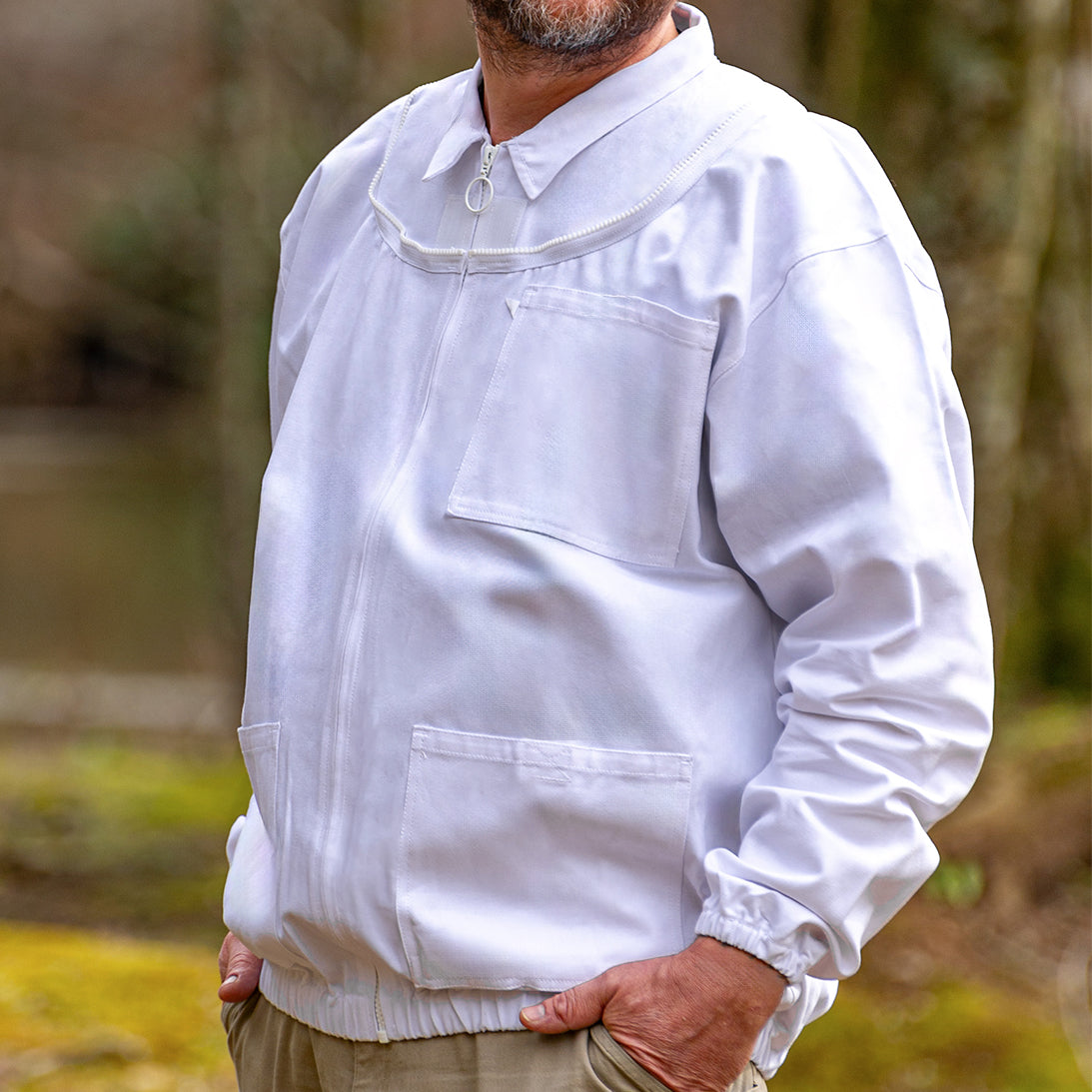 Front view of 100% cotton inspector-style beekeeping jacket without veil