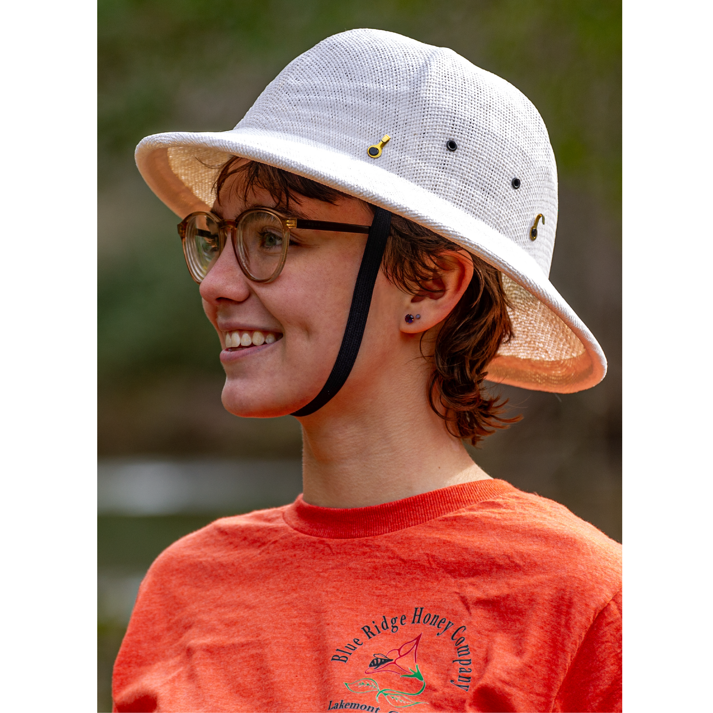 Premium woven beekeeping helmet with adjustable band and veil hooks side view